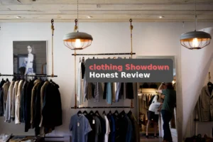 person leaning on wall while holding gray hat