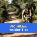 A man riding a bike down a dirt road