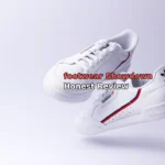 white adidas low-top sneakers