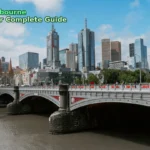 white bridge across city buildings