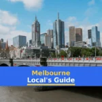 white bridge across city buildings