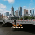white bridge across city buildings