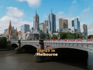 white bridge across city buildings